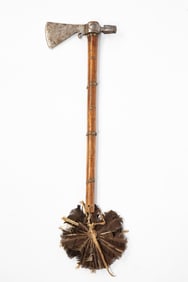 PLAINS PIPE TOMAHAWK WITH SUNBURST FEATHERS TRAIL.