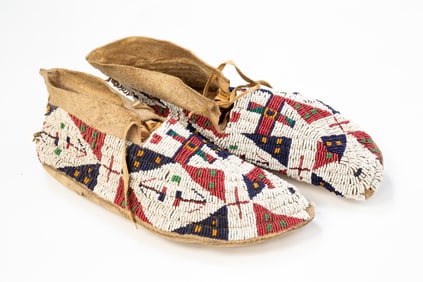 PAIR OF PLAINS BEADED HIDE MOCCASINS.