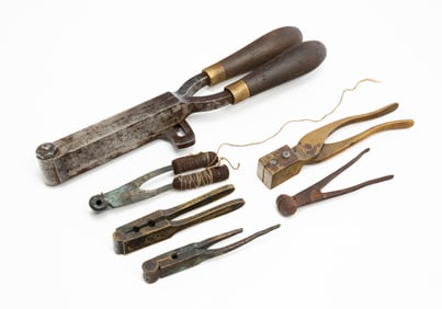 SIX IRON AND BRASS BULLET MOLDS, INCL. MULTI-CAVITY AND "COLT" STAMPED EXAMPLE.