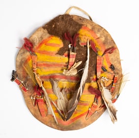 PLAINS DECORATED BUFFALO HIDE SHIELD.