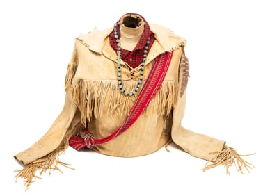 FRINGED BUCKSKIN SHIRT ON MANNEQUIN.