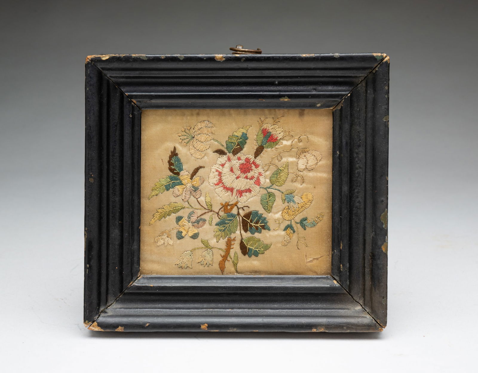 DIMINUTIVE AMERICAN NEEDLEWORK SAMPLER ON SILK. (1 of 3)