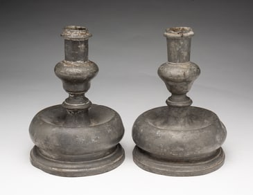 NEAR PAIR OF EUROPEAN PEWTER CAPSTAN CANDLESTICKS.