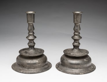 PAIR OF EUROPEAN PEWTER CAPSTAN CANDLESTICKS.