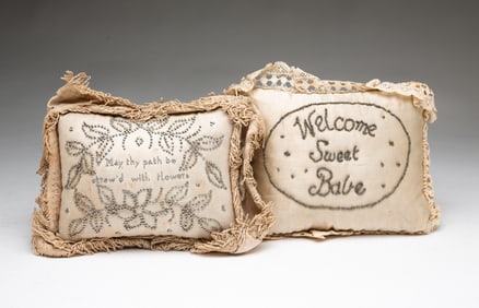 TWO 19TH CENTURY CHRISTENING PILLOWS.