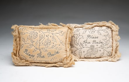 TWO 19TH CENTURY CHRISTENING PILLOWS.