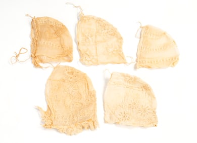 FIVE EXQUISITE AMERICAN HANDMADE LACE BABY CAPS.