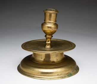 EUROPEAN BRASS CAPSTAN CANDLESTICK.