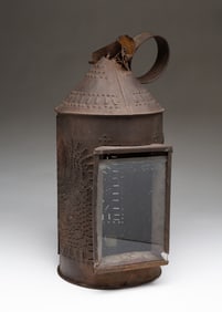 AMERICAN PUNCHED TIN AND GLASS CANDLE LANTERN.