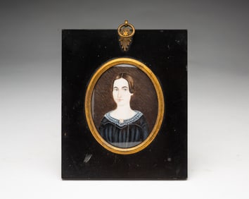 MINIATURE AMERICAN SCHOOL WATERCOLOR PORTRAIT OF A YOUNG WOMAN.