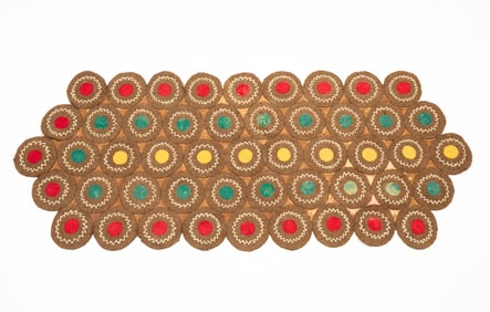 WONDERFUL AMERICAN WOOL AND FELT PENNY RUG.