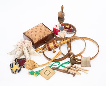 COLLECTION OF TWENTY-ONE SEWING ACCESSORIES.