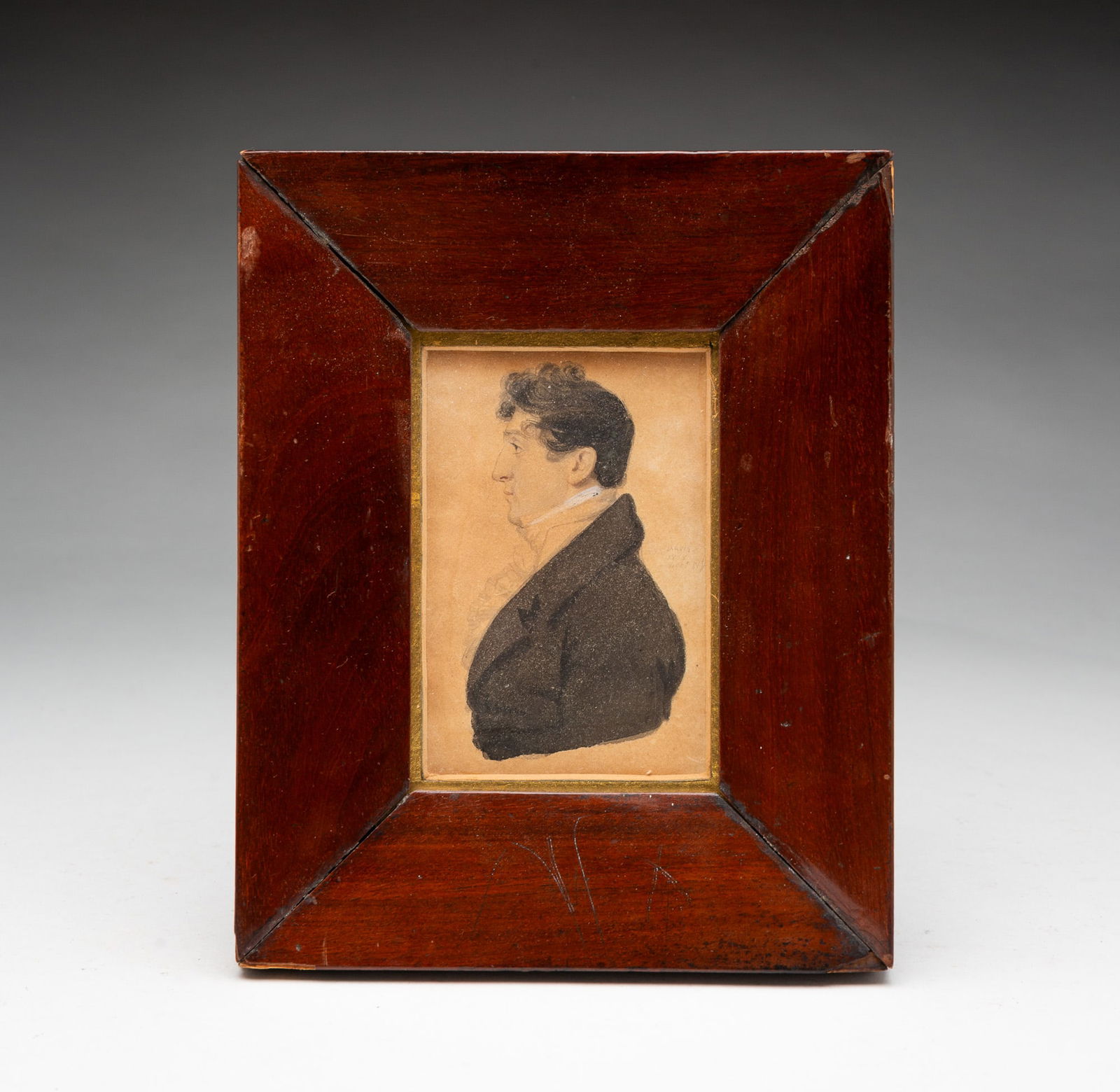 JOHN WESLEY JARVIS (ENGLISH, LIVED AND WORKED IN THE U.S. 1780-1839) MINIATURE WATERCOLOR PORTRAIT: Profile portrait of a gentleman facing left, with curly, upswept hair, a high-collared and frilly white shirt and black jacket, signed "Jarvis 1808" at right, in a beveled wood frame with gilt liner.