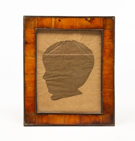 LARGE AMERICAN SCHOOL HOLLOW-CUT SILHOUETTE PORTRAIT OF A CHILD.