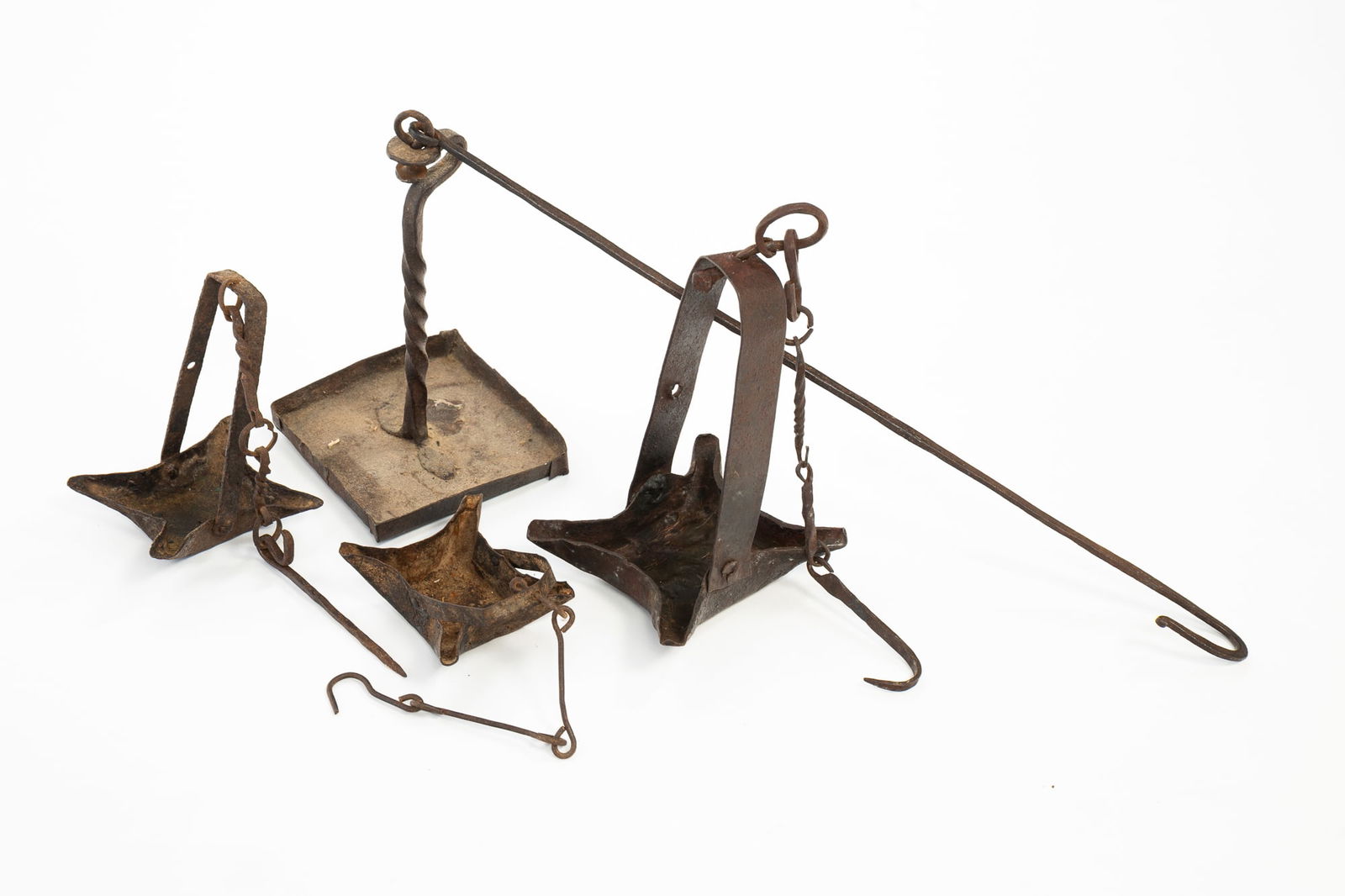 FOUR AMERICAN BLACKSMITH-MADE HANGING LIGHTING DEVICES. (1 of 3)