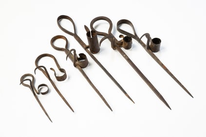 SIX AMERICAN WROUGHT IRON STICKING TOMMYS.