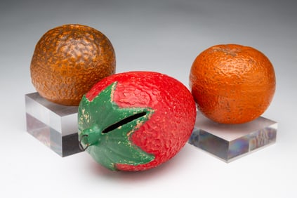 THREE AMERICAN PAINTED STONEWARE FRUIT STILL BANKS.