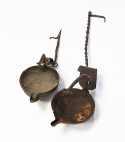 TWO AMERICAN WROUGHT IRON HANGING GREASE LAMPS.