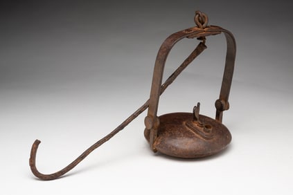 AMERICAN CAST IRON MINER'S LAMP WITH CHICKEN FINIAL.