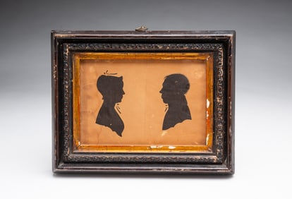 PAIR OF A. WHEELER (AMERICAN) HOLLOW-CUT SILHOUETTE PORTRAITS OF LADY AND GENTLEMAN.