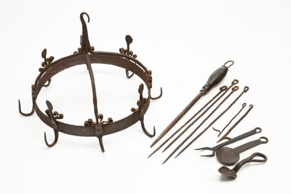 AMERICAN WROUGHT IRON HANGING UTENSIL HOLDER WITH TEN UTENSILS.
