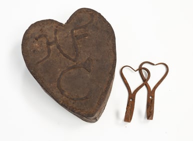AMERICAN WROUGHT IRON HANGING HEART WITH TWO HEART HOOKS.