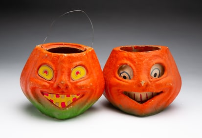 TWO GERMAN PAINTED PAPER PULP HALLOWEEN JACK-O-LANTERNS.