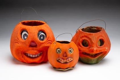 THREE GERMAN PAINTED PAPER PULP HALLOWEEN JACK-O-LANTERNS.