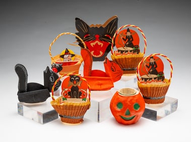 COLLECTION OF EIGHT HALLOWEEN CANDY CONTAINERS AND NUT CUPS.
