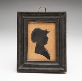 AMERICAN SCHOOL HOLLOW-CUT AND INK WASH SILHOUETTE PORTRAIT OF A LADY.