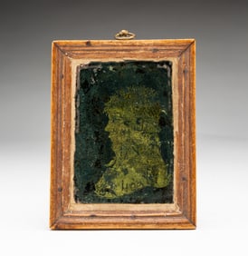 EGLOMISE SILHOUETTE PORTRAIT OF A YOUNG MAN.