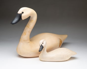 TWO AMERICAN CARVED AND PAINTED SWAN DECOYS, INCL. FRENCH BROAD RIVER AND DUCWORKS.