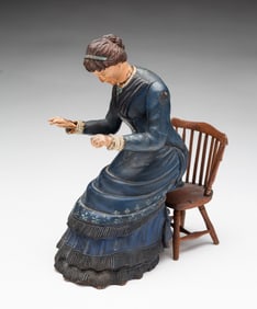 AMERICAN FOLK ART WOOD CARVING OF A LADY.