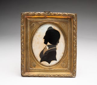 AMERICAN SCHOOL HOLLOW-CUT AND GOUACHE SILHOUETTE PORTRAIT OF A GENTLEMAN.