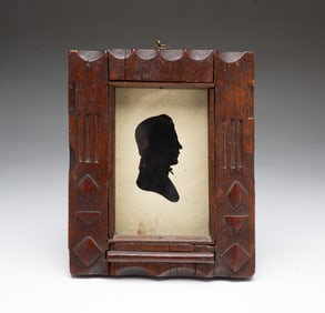 AMERICAN SCHOOL HOLLOW-CUT SILHOUETTE PORTRAIT OF A YOUNG GENTLEMAN.