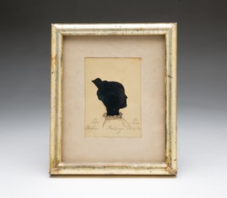 AMERICAN SCHOOL HOLLOW-CUT AND INK SILHOUETTE PORTRAIT OF ADELINE PARTRIDGE MORTON.
