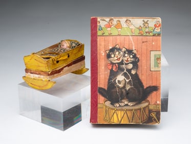 BABY IN A CRADLE AND CHILDREN'S BOOK PIPSQUEAK TOYS.