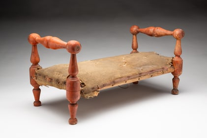 AMERICAN RED-WASHED CHERRY CHILD'S DOLL BED WITH STRAW MATTRESS.