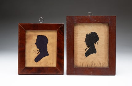 TWO AMERICAN HOLLOW-CUT SILHOUETTE PORTRAITS OF A MAN AND WOMAN.