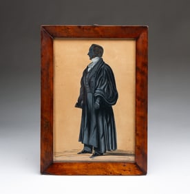 ENGLISH CUT PAPER AND GOUACHE SILHOUETTE PORTRAIT OF A LEARNED GENTLEMAN.