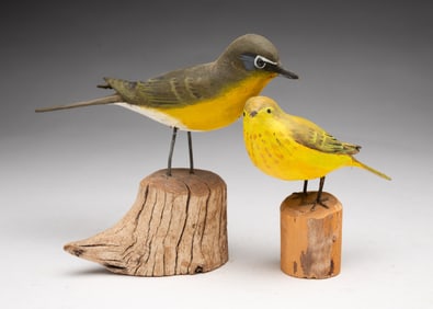 TWO PETER PELTZ (AMERICAN, 1915-2001) FOLK ART CARVED AND PAINTED WOOD BIRDS.