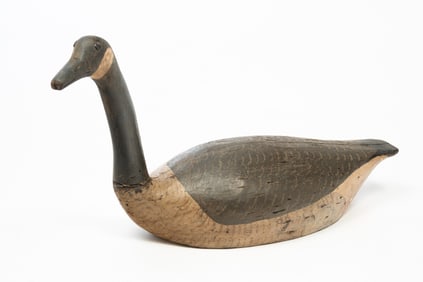 AMERICAN CARVED AND PAINTED CANADIAN GOOSE DECOY.