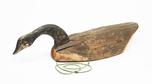 AMERICAN CARVED AND PAINTED CANADIAN GOOSE DECOY.