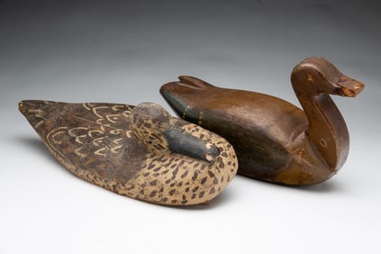 TWO AMERICAN CARVED AND PAINTED WORKING DUCK DECOYS.