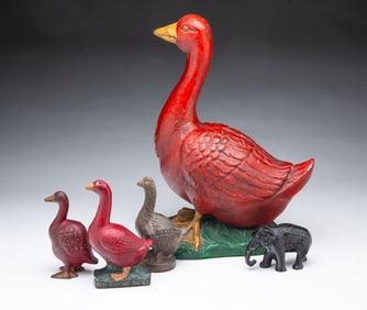 FIVE AMERICAN CAST IRON AND PLASTER ADVERTISING ITEMS, INCL. RED GOOSE SHOES.