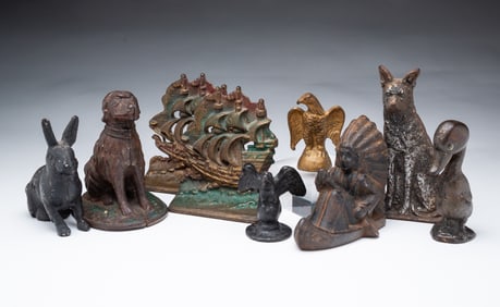 NINE AMERICAN CAST IRON FIGURES, INCL. GERMAN SHEPHERD DOORSTOP.
