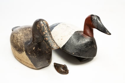 THREE AMERICAN CARVED AND PAINTED DUCK DECOYS.