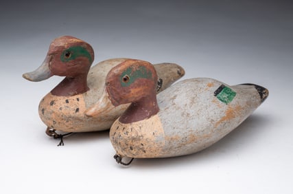 PAIR OF DIMINUTIVE CARVED AND PAINTED BLUE-WINGED TEAL DUCK DECOYS.