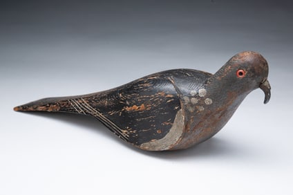 AMERICAN CARVED AND PAINTED PINE PIGEON DECOY.