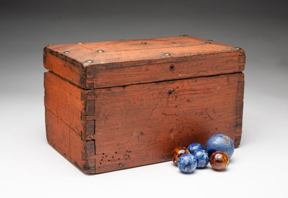 AMERICAN PINE BOX WITH HAND-ROLLED CLAY MARBLES.